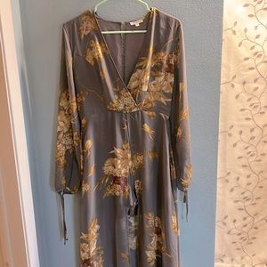 Beautiful romper with sheer long sleeves